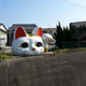 Illustration for article titled Attack on Giant Lucky Cat